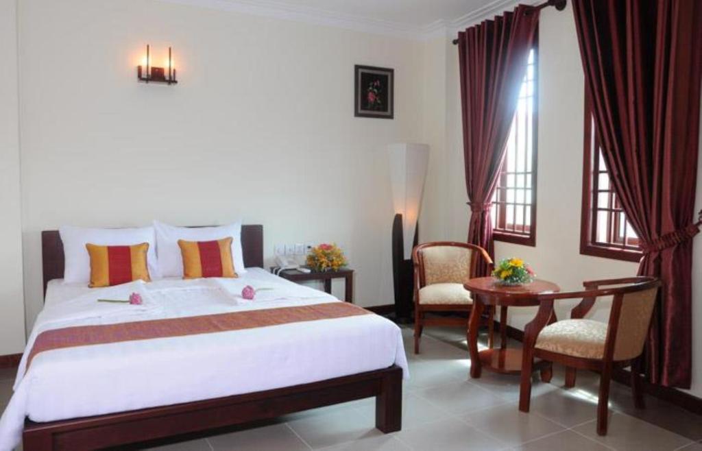 V N E Hotel Phnom Penh Phòng bức ảnh